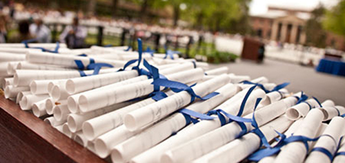 Rolled diplomas at UNR graduation ceremony